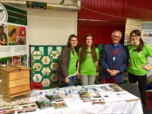 Our Science team, Alice, Lucy and Laura with Tony Shaw, President of the Welsh Beekeepers' Association